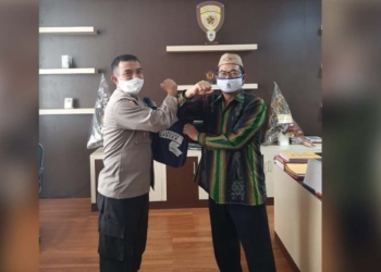 Karo SDM Polda Gorontalo Kombes Pol M. Arif, MH bersama Direktur UT Gorontalo M. Husni Arifin, Ph.D, dalam kunjungannya, Kamis (22/7/2020)