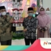 CStaf Ahli Wali Kota Bidang SDM dan Kemasyarakatan Setda Kota Gorontalo, Mahmud Baderan, mewakili Pemerintah Kota Gorontalo, saat menerima Piala Juara Umum STQH tingkat Provinsi Gorontalo tahun 2021.
