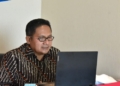 Wali Kota Gorontalo, Marten Taha saat membuka Rakorev Penyerapan Anggaran Triwulan III secara Virtual. (istimewa/nn)