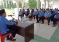 Bupati Boalemo, Anas Jusuf memimpin rapat bersama pimpinan OPD di Tribun Alun-Alun Tilamuta.(F.Istimewa)