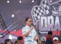 Plt Bupati Gorut, Thariq Modanggu saat membuka GE8 Squad Drag Race Open Tournament di Kabupaten Gorut yang dipusatkan di Jalan Bypass Kecamatan Kwandang, Desa Bulalo, Sabtu (4/6). (Foto : hmskominfo_gorut)