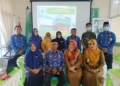 Kepala Puskesmas Paguyaman, Zulha J.A. Pakai bersama Camat Paguyaman dan lintas sektor menggelar lokakarya.(F.Eca-nn)
