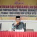 Bupati Gorontalo Utara (Gorut) Thariq Modanggu saat memberikan sambutannya usai melantik pejabat dilingkup Kabupaten Gorut, pada Senin (2/1/2023). (foto.ist)