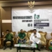 Penjabup Boalemo, Hendriwan memberikan arahan pada musyawarah KOHATI ke II HMI Cabang Kabupaten Boalemo.(f.dok.humas)