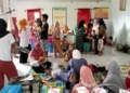 Puskesmas Paguyaman menggelar kegiatan Posyandu bagi Balita.(f.istimewa)