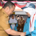 Penjagub Ismail Pakaya bersama siswa baru di SMA Negeri 7 Kota Gorontalo pada penerimaan siswa baru sekaligus meresmikan program lima hari sekolah di SMA 7 Kota Gorontalo, Senin (10/7/2023). Foto – Mila