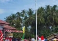 Aksi heroik Riski Lamato siswa SMA Negeri 9 Gorontalo Utara, pada saat upacara HUT RI ke-78 di lapangan Kecamatan Sumalata Timur. (f.ist)
