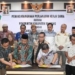 Penjabup Boalemo, Sherman Moridu menandatangani MoU bersama Kejari Boalemo berkaitan penanganan masalah hukum perdata.(f.dok.hms)