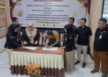 Penandatanganan Kerjasama KPU-POLRES Bone Bolango. (foto. anq/nn)