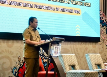 Penjagub Ismail Pakaya saat memberikan sambutan pada forum Konsultasi Publik Penyusunan RKPD 2025.(F.Winda)