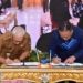 Penjagub Gorontalo, Rudy Salahuddin saat MoU dengan pihak BP2MI. (foto. via/nn)