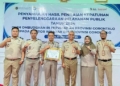 Kantor Pertanahan Kota Gorontalo saat menerima penghargaan dari Obudsman RI Perwakilan Gorontalo.