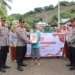 Polres Boalem berbagi sembako dan penampungan air bersih untuk warga Dusun Tambe.