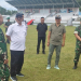 Bupati Boalemo, Drs. Rum Pagau didampingi Wabup Lahmuddin Hambali menyambut kunjungan kerja Pangdam XIIIMdk, Mayjen TNI Mirza Agus di Stadion Pemuda Boalemo.(f.dok.pimpinan)