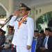 Bupati Boalemo, Drs. Rum Pagau memimpin jalannya upacara peringatan Hari Otda ke XXX tahun 2026.(f.dok.pimpinan)