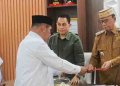 Pengurus DPD PSI Bone Bolango Silaturahmi dengan Bupati Ismet Mile. (foto.ist)