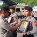 Kapolresta Gorontalo Kota Kombes Pol Suryono saat memimpin upacara PTDH terhadap 2 anggota polri yang melakukan pelanggaran berat dan mencederai nama baik institusi.