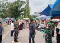 Anggota Kodim Pohuwato saat ikut melakukan penjagaan di kegiatan majelis taklim akbar Randangan-Taluditi