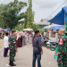 Anggota Kodim Pohuwato saat ikut melakukan penjagaan di kegiatan majelis taklim akbar Randangan-Taluditi