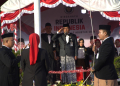 Kepala Kanwil Kemenhaj Gorontalo Mansur saat menjadi inspektur upacara peringatan hari Kemerdekaan RI ke-81 di halaman UPT asrama haji Kemenhaj Provinsi Gorontalo.