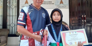 Wabup Iwan Adam bersama salah satu atlet muda berprestasi