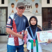 Wabup Iwan Adam bersama salah satu atlet muda berprestasi