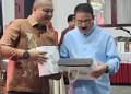 Bupati Boalemo, Rum Pagau bersama Kapolres Boalemo, Sigit Rahayudi tampak akrab di tengah-tengah rangkaian pisah sambut.(f.dok.pimpinan)