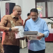 Bupati Boalemo, Rum Pagau bersama Kapolres Boalemo, Sigit Rahayudi tampak akrab di tengah-tengah rangkaian pisah sambut.(f.dok.pimpinan)