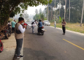 Kegiatan bagi-bagi masker oleh Puskesmas Patilanggio, pemerintah kecamatan, Polsek Patilanggio, pemerintah desa, dan KNPI