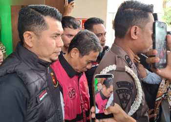 Eks Pj Gubernur Hamka Hendra Noer saat digiring ke Lapas Gorontalo usai terseret kasus dugaan korupsi Command Center Video Wall yang merugikan negara sebesar Rp 1.7 Milyar.